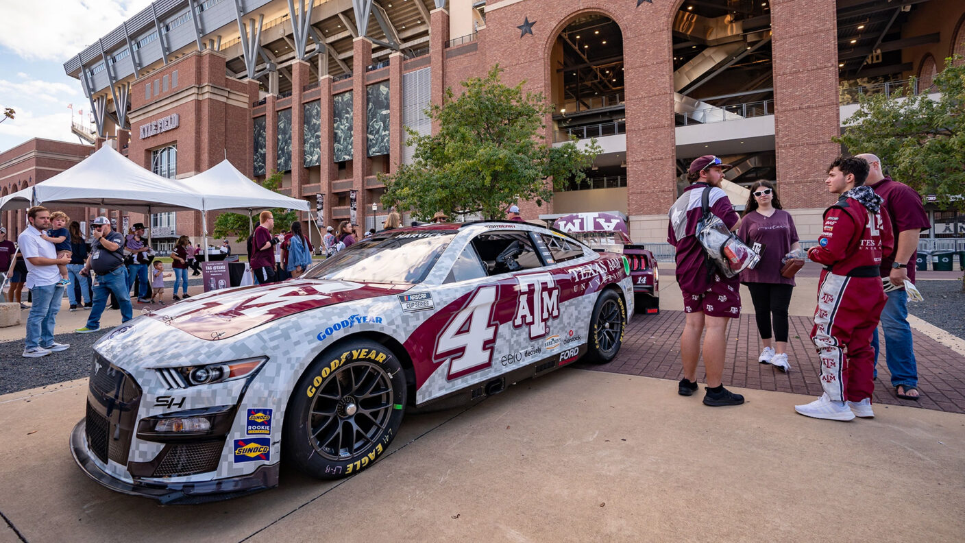 NASCAR vehicle on display in front of Kyle Field before a football game